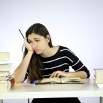 Girl studying unhappy and depressed